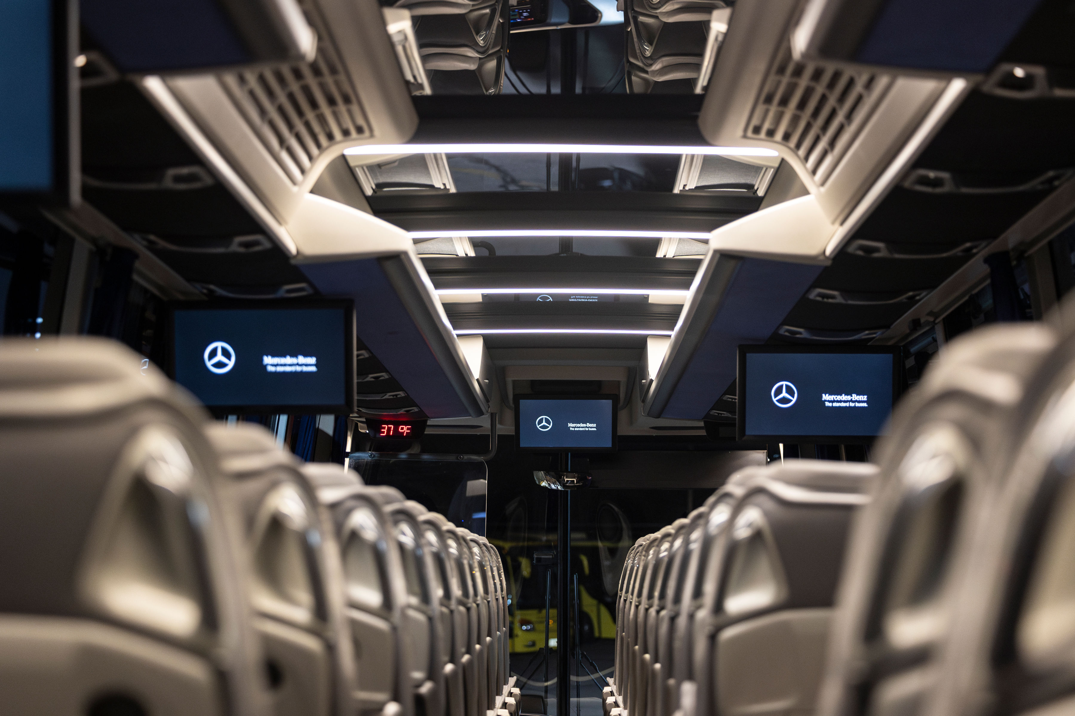 Mercedes coach interior with entertainment screens