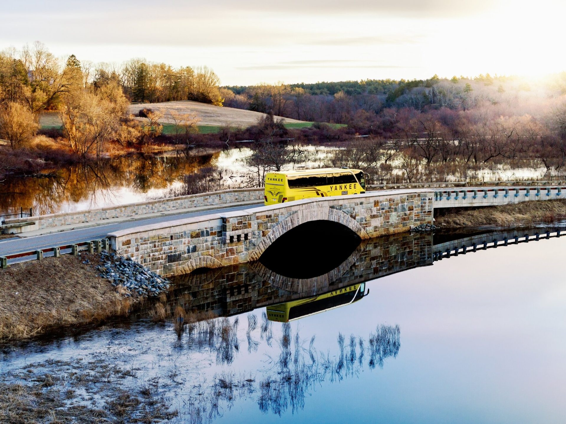 Yankee Line coach crossing a bridge in New England