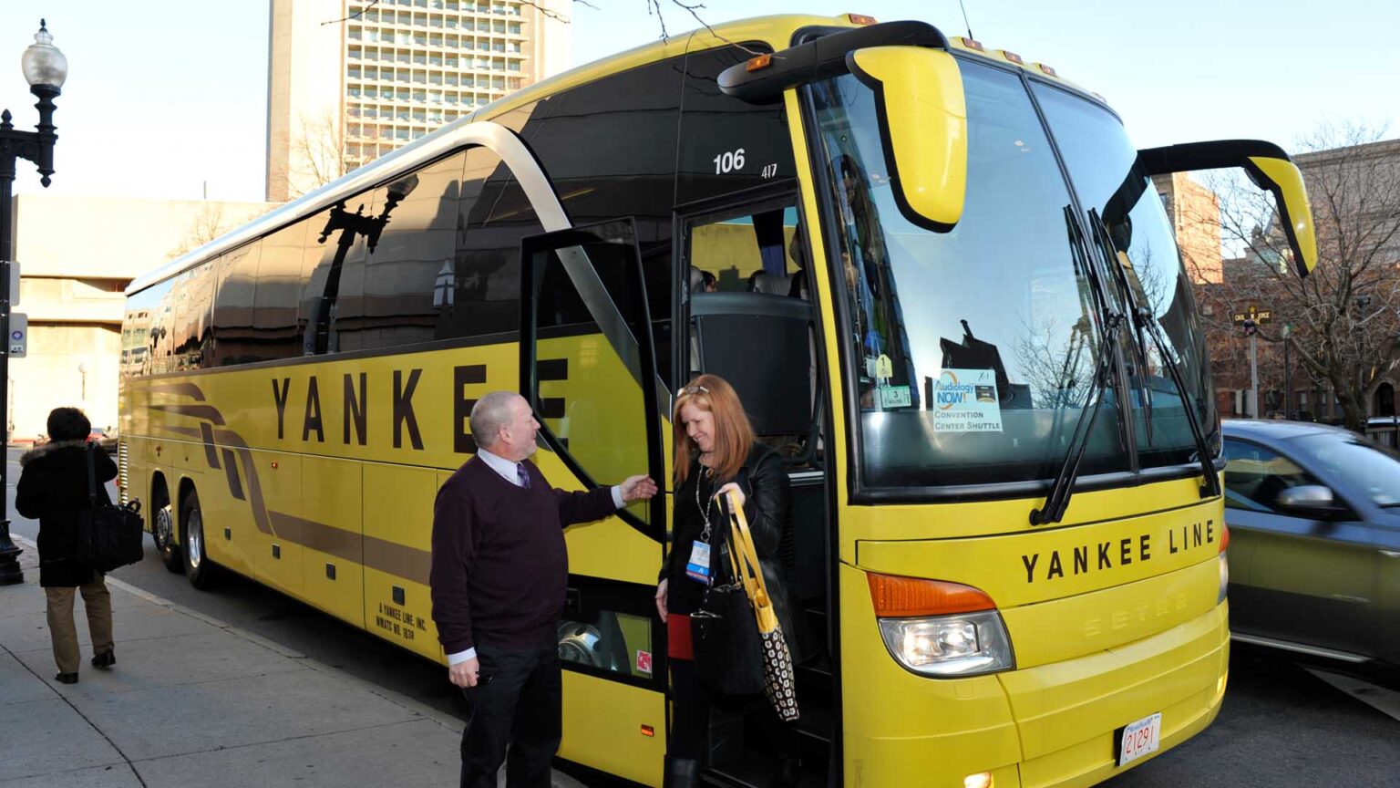 Yankee Line coach at a curbside pickup