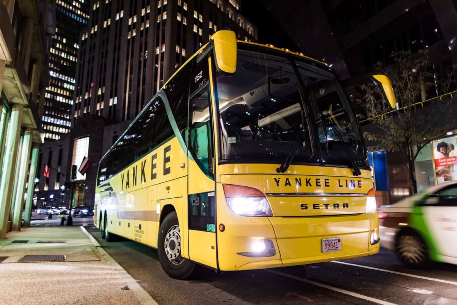 Yankee Line coach at night in the city