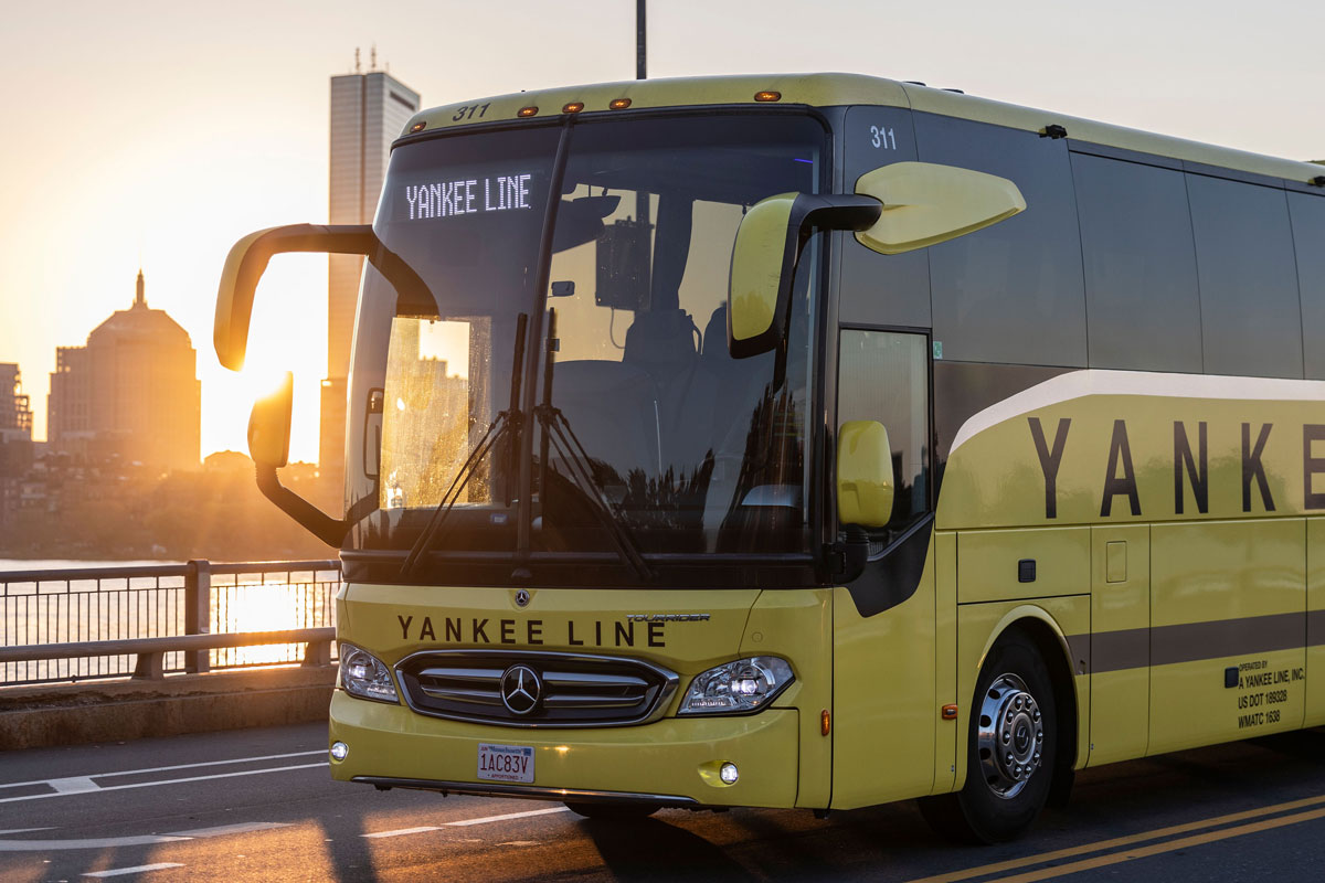 Yankee Line coach in Boston at sunset